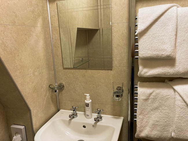 b&b bathroom sink and towels